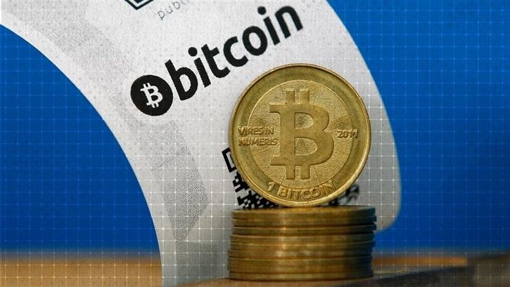 "تاسي" يتراجع للجلسة الثالثة.. و"بتكوين" دون 120 ألف دولار
